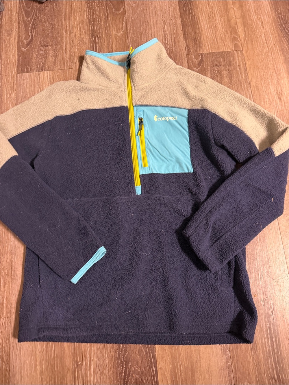 cotopaxi Navy and Tan Fleece Quarter-Zip with Aqua Pocket and Yellow Zip